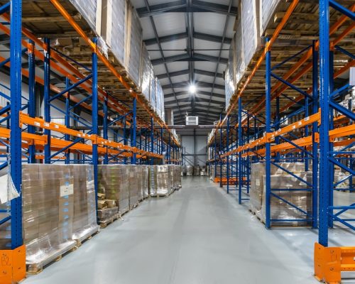 Spacious,Warehouse,Interior,With,Tall,Racking,Systems,Displaying,Stacked,Pallets